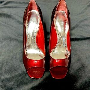 GUC deep maroon color. Slight marks on the heels nothing too noticeable.